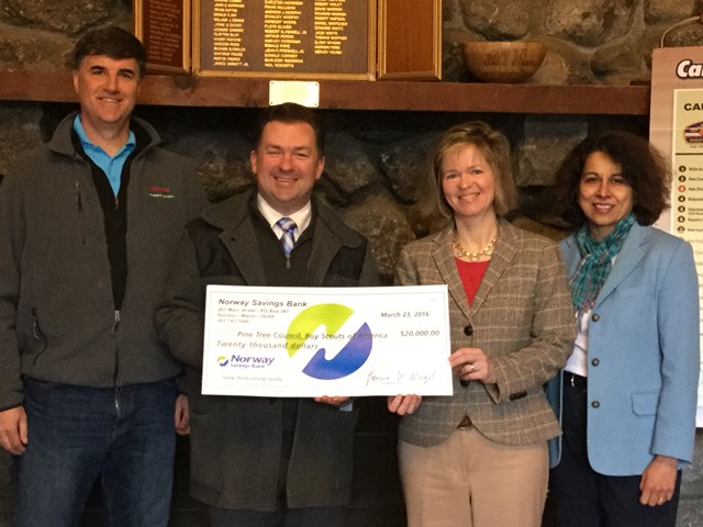 NSB employees presenting a donation check 