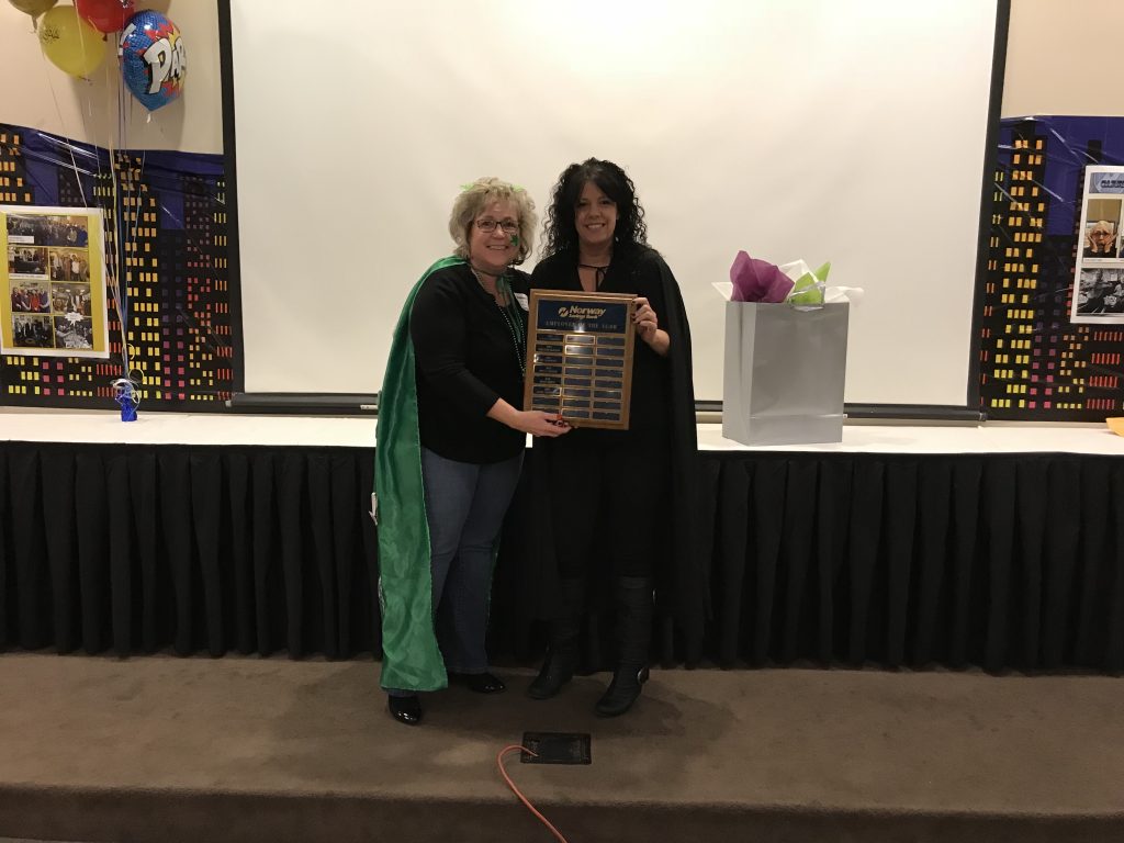 2 people with an award.