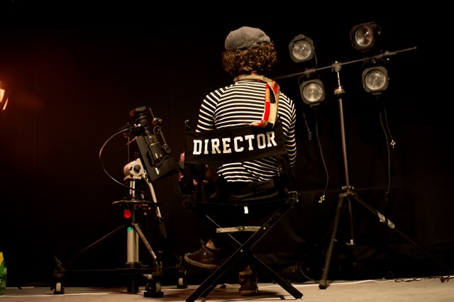 Man in Director chair