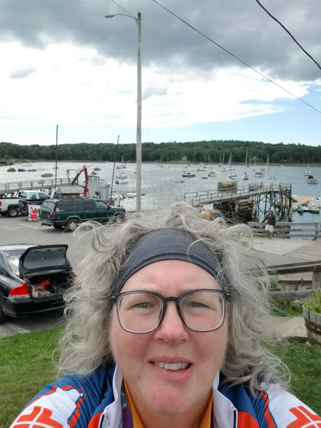 Kelly in front of boats