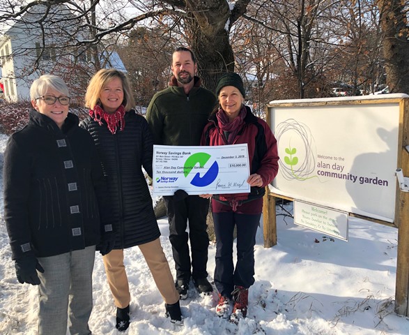 Group check presentation at Alan Day Community Garden