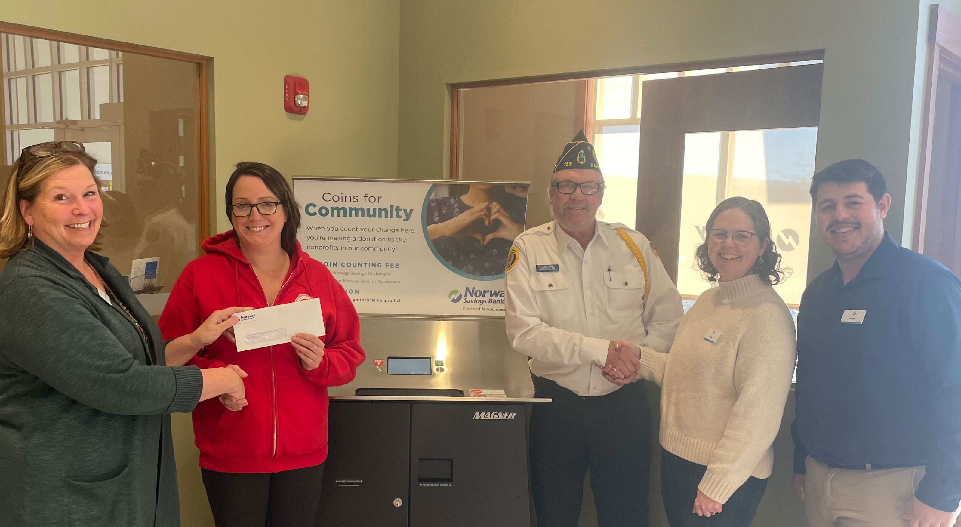 NSB employees present check to American legion members
